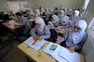 Palestinian students crammed in the schools of Relief and Works Agency refugees "UNRWA"